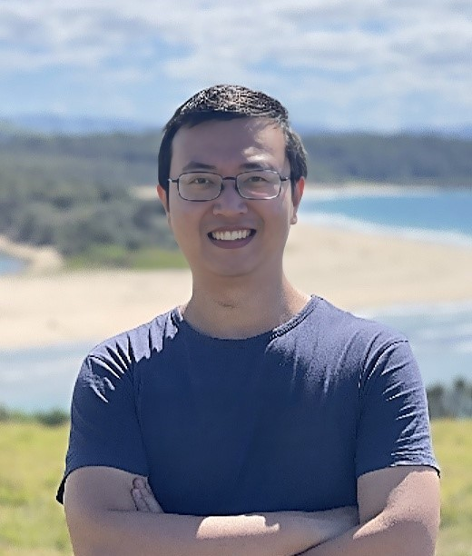 Headshot of Hu Wang.